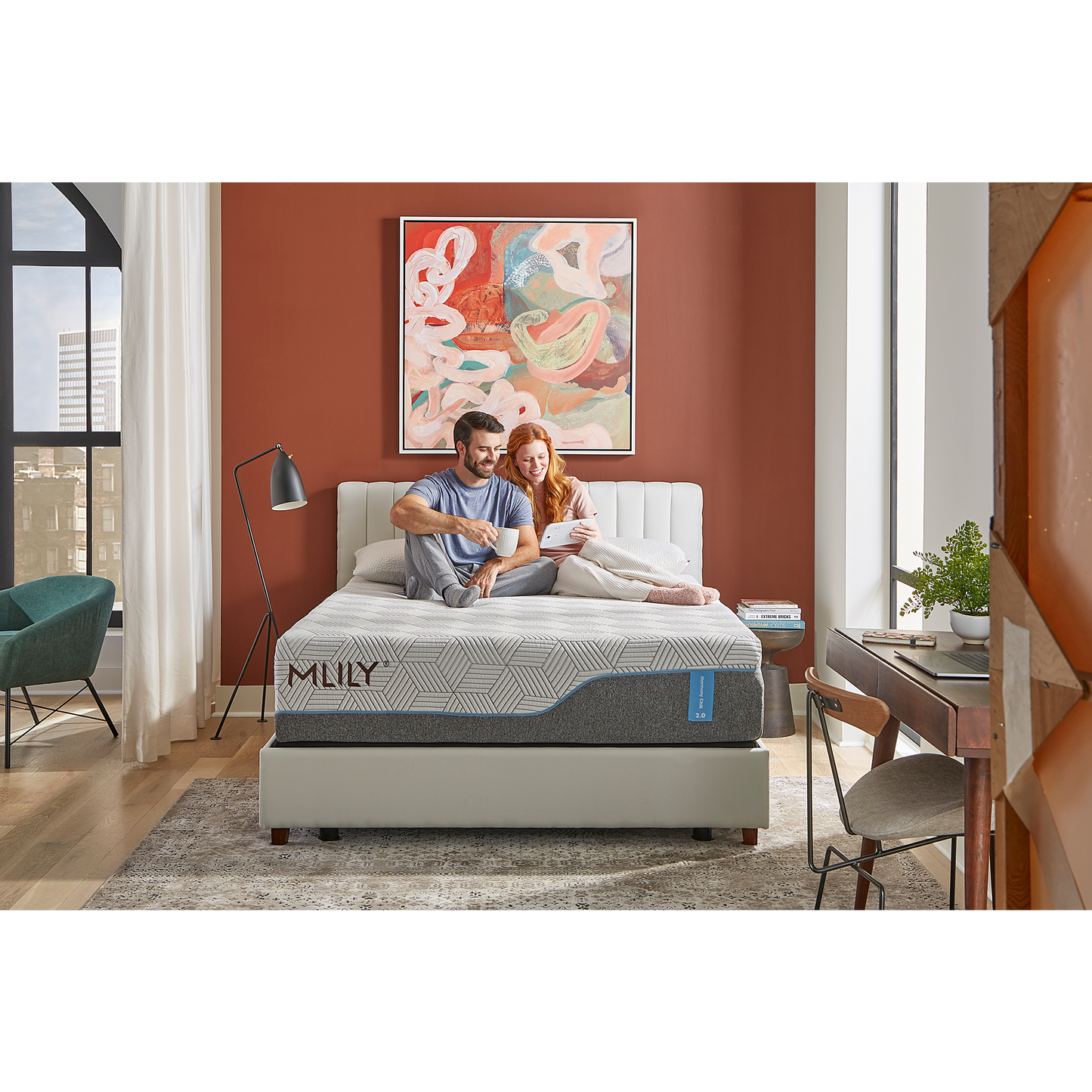 Harmony Chill 2.0 13" Memory Foam Mattress With Advanced Temperature Regulation Inside Of A Bedroom With A Man And Woman Sitting Upright