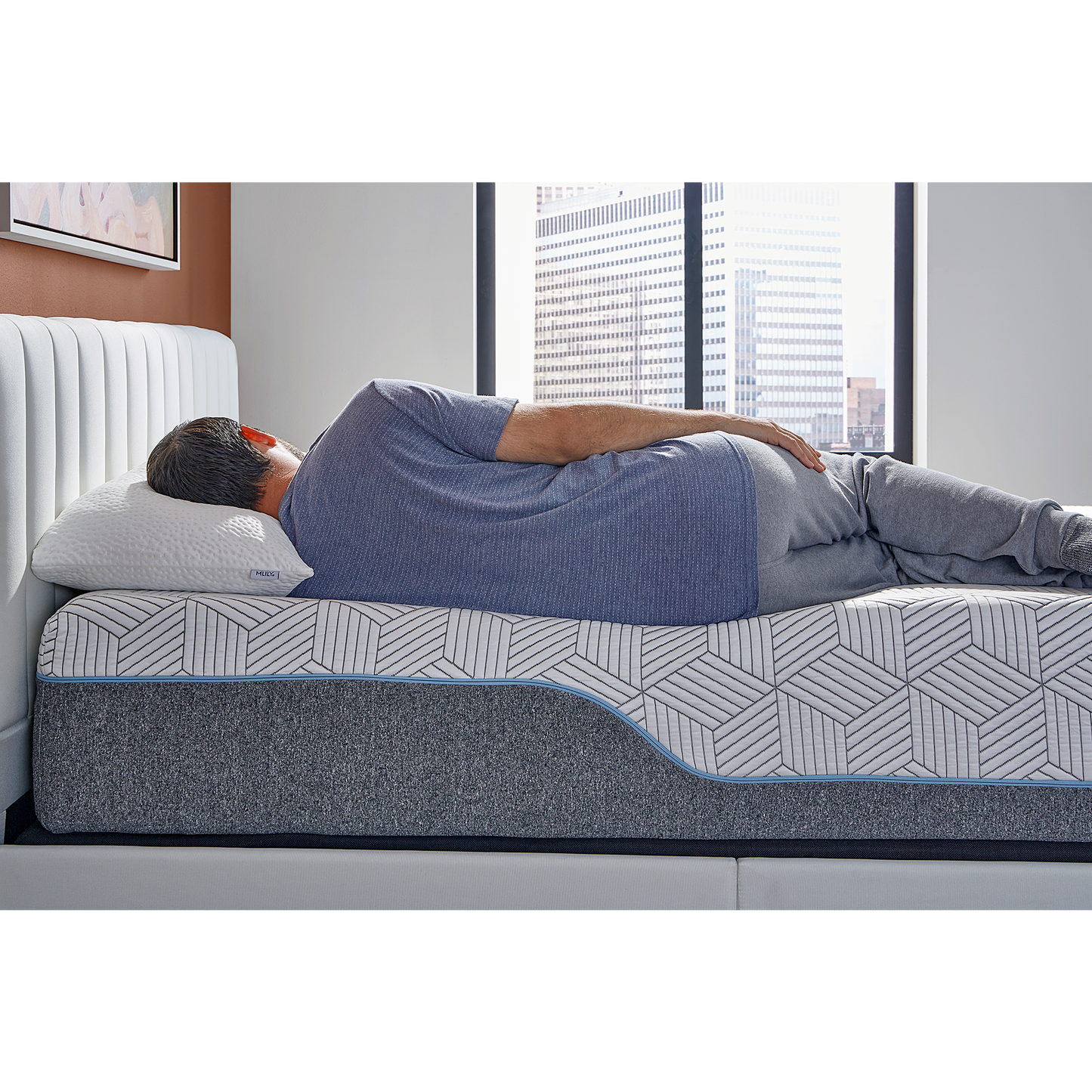 Harmony Chill 2.0 13" Memory Foam Mattress With Advanced Temperature Regulation Inside Of A Bedroom With A Man Sleeping On His Side