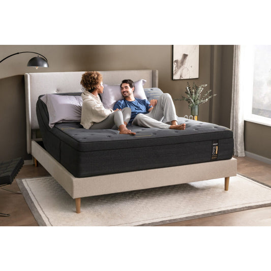 ONYX Max 14" Hybrid Mattress With Copper Infused Memory Foam Inside Of A Bedroom With A Man And Woman Enjoying Each Other's Company