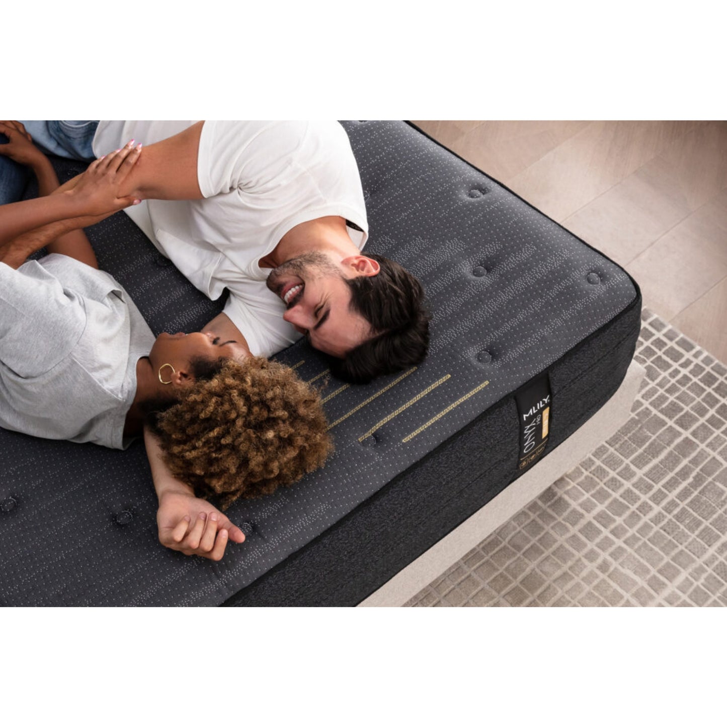 ONYX Pro 13" Hybrid Mattress With Copper Infused Memory Foam, Overhead View With A Man And Woman Expressing Their Love