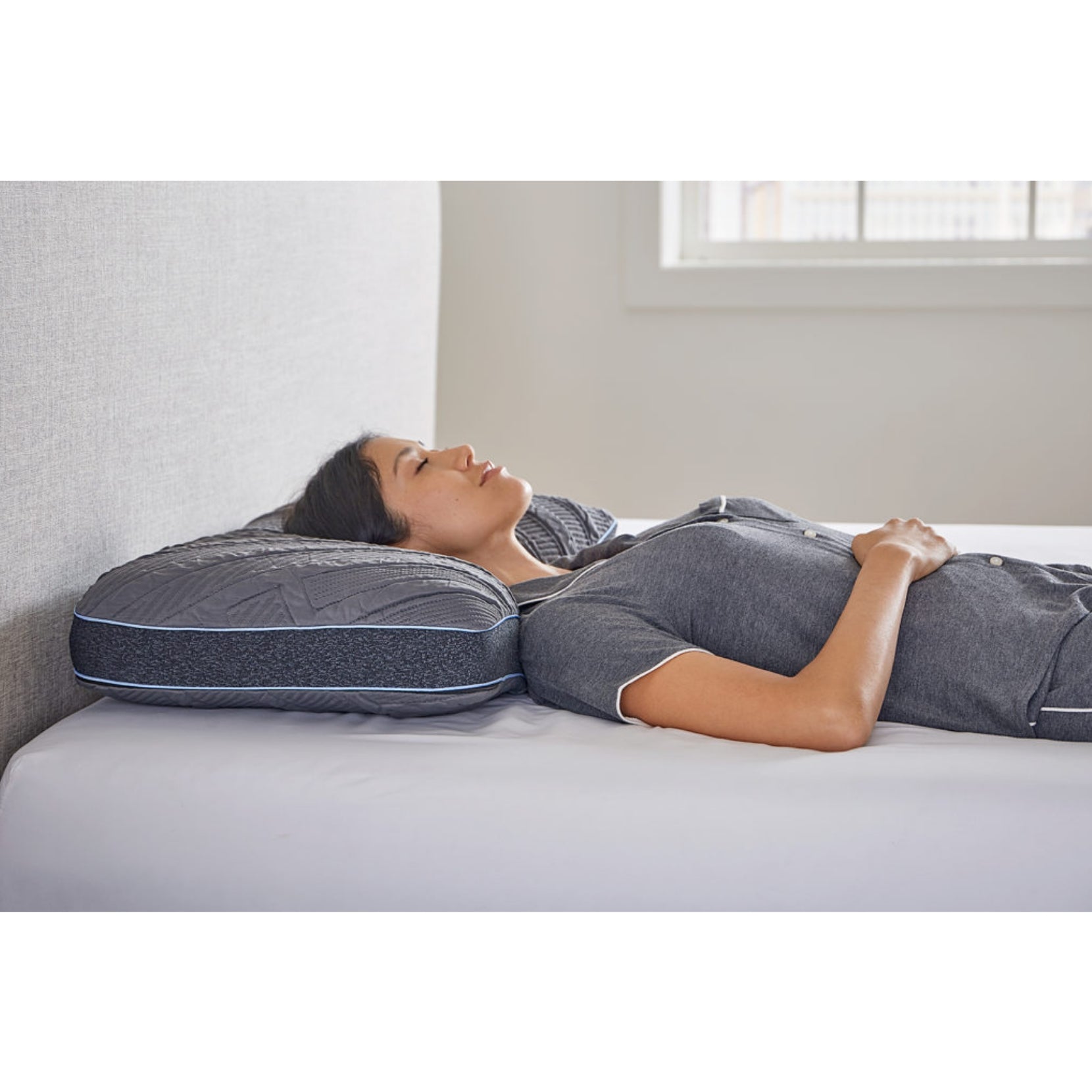 PowerCool 11.5" Hybrid Mattress With Ventilated Memory Foam Pillow(s) And Adjustable Base Featuring Integrated Cooling Fans, Woman Sleeping On Her Back